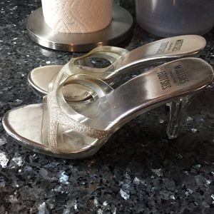 silver and clear heels